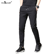 Load image into Gallery viewer, Men's Autumn Casual Sport Pants Men Elastic Nine Pants Small Feet Joggers Pants Drawstring Beam Pants Versatile Trousers Homme
