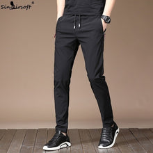 Load image into Gallery viewer, Men's Autumn Casual Sport Pants Men Elastic Nine Pants Small Feet Joggers Pants Drawstring Beam Pants Versatile Trousers Homme