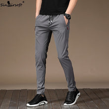 Load image into Gallery viewer, Men's Autumn Casual Sport Pants Men Elastic Nine Pants Small Feet Joggers Pants Drawstring Beam Pants Versatile Trousers Homme